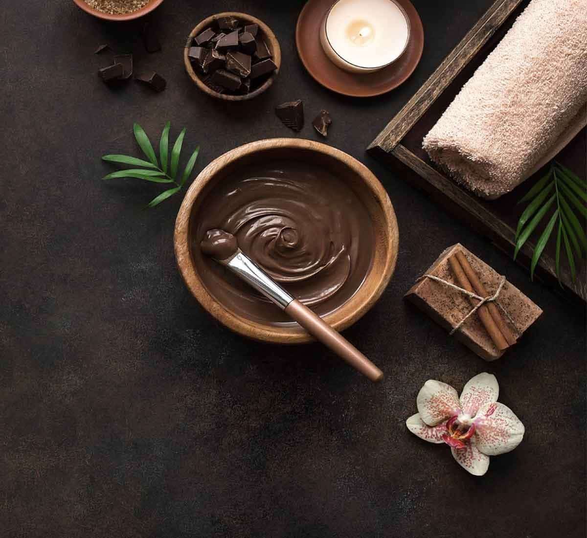 spa in laguna phuket: Chocolate spa mask with candle and towels at Apsara Spa, Phuket