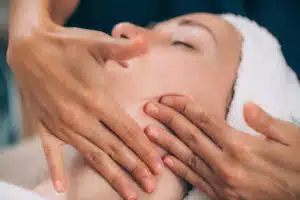 Facial treatment in Phuket: Relaxing facial massage for skin rejuvenation at a luxury spa.