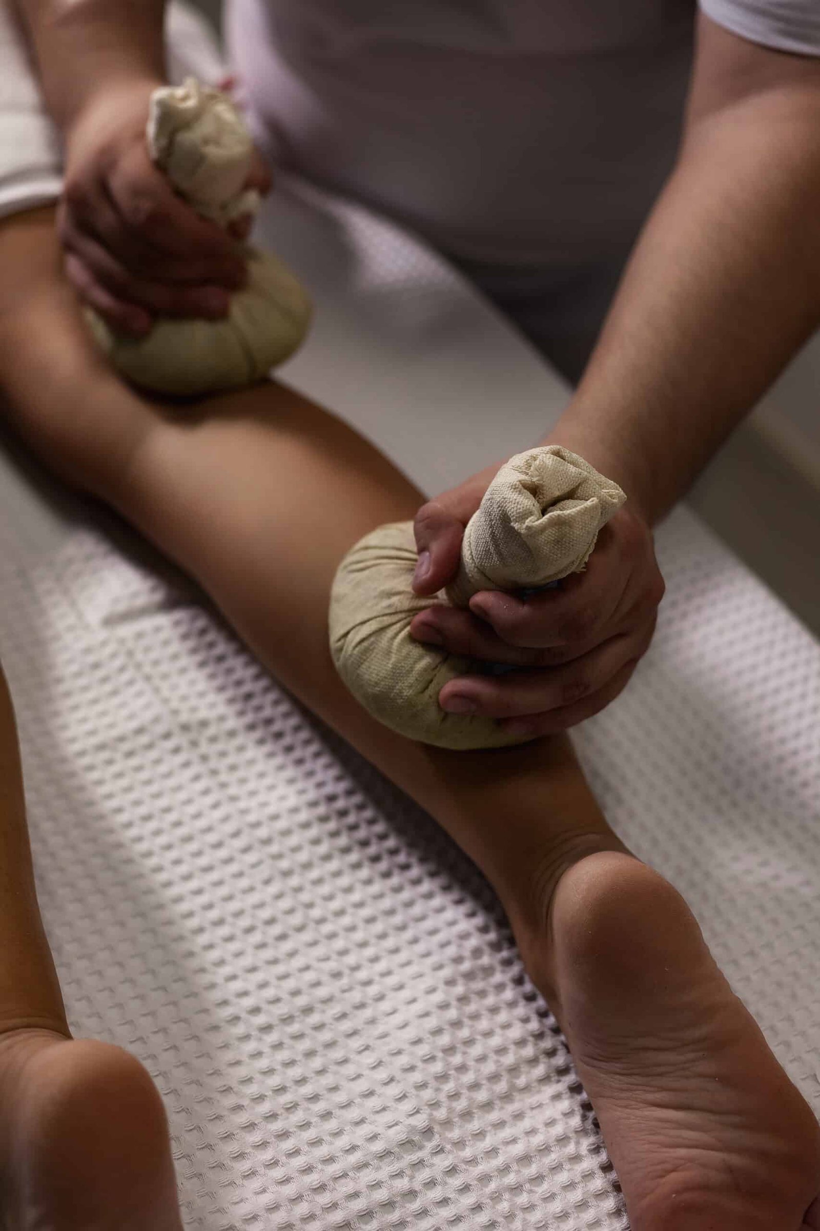 spa in laguna phuket: Chocolate spa mask with candle and towels at Apsara Spa, Phuket
