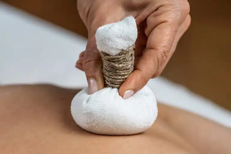 herbal compress massage: Traditional herbal compress massage in Phuket for relaxation and pain relief.