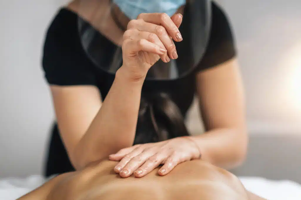 deep tissue massage in Phuket: Therapist performing deep tissue massage.